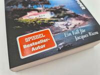 Außenansicht des Buches „Das achte Paradies“