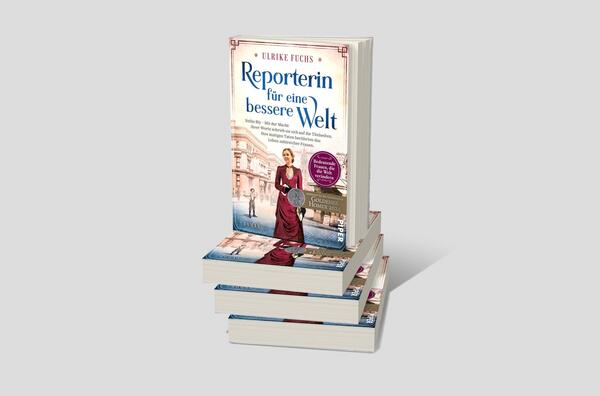 Bücherstapel des Buches „Reporterin für eine bessere Welt“