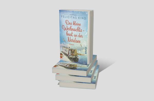Bücherstapel des Buches „Das kleine Weihnachtsboot an der Nordsee“