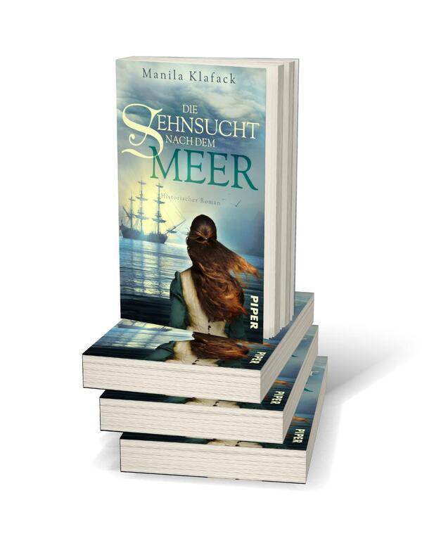 Bücherstapel des Buches „Die Sehnsucht nach dem Meer“