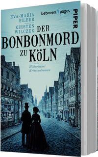 Das Buchcover zeigt eine historische Stadtansicht von Köln in gedämpften Blautönen. Im Vordergrund stehen zwei silhouettenhafte Figuren: eine Frau in einem langen Kleid und ein Mann mit Hut. Die Straßen sind gesäumt von alten Gebäuden mit charakteristischen Fenstern und einem Laden mit dem Schriftzug „Süßwaren“. Der Titel „DER BONBONMORD ZU KÖLN“ ist in großen, schwarzen Buchstaben in der Mitte platziert, während die Autoren „Eva-Maria Silber“ und „Kirsten Wilczek“ oben in kleinerer Schrift erscheinen. Unten steht „Historischer Kriminalroman“.