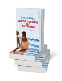 Bücherstapel des Buches „Wiedersehen im Seehaus“