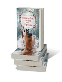 Bücherstapel des Buches „Weihnachtszauber mit Alpakas“