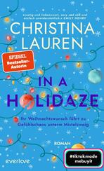 In a Holidaze – Ihr Weihnachtswunsch führt zu Gefühlschaos unterm Mistelzweig In a Holidaze – Ihr Weihnachtswunsch führt zu Gefühlschaos unterm Mistelzweig