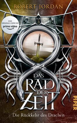 Das Rad der Zeit 3 Das Buchcover zeigt einen dramatischen Hintergrund in warmen Gold- und Brauntönen. Im Zentrum ist ein majestätisches Schwert zu sehen, das aus einer Landschaft aufsteigt. Umrahmt wird das Bild von einer stilisierten, schlangenförmigen Darstellung, die den Titel „DAS RAD DER ZEIT“ in großen, geschwungenen Buchstaben umfasst. Am oberen Rand befindet sich der Autorennamen „ROBERT JORDAN“. Ein Hinweis auf die Serie „EINE ORIGINIAL-SERIE BEI PRIME VIDEO“ ist auf einem Aufkleber platziert.