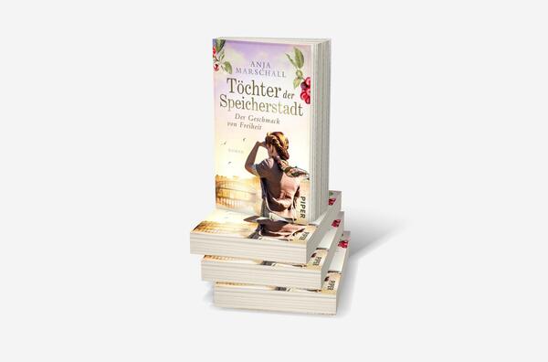 Bücherstapel des Buches „Töchter der Speicherstadt – Der Geschmack von Freiheit“