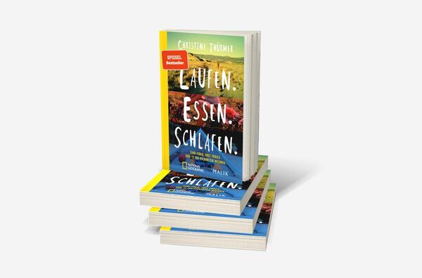 Bücherstapel des Buches „Laufen. Essen. Schlafen. “