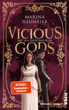 Vicious Gods – Pakt aus Staub und Feuer Das Buchcover zeigt vor dunkelrotem, rauchigem Hintergrund ein vergoldetes, ornamentales Rahmenornament; im Vordergrund zwei Figuren Rücken an Rücken: links eine junge Frau in fließendem weißen Kleid, rechts ein dunkler, gleichaltriger Mann in moderner, dunkler Kleidung. Der Titel Vicious Gods erscheint groß in goldener, verschnörkelter Serifenschrift, darüber die Autorin Marina Neumeier, darunter die Unterzeile „Pakt aus Staub und Feuer“. Stimmung: geheimnisvoll und spannungsgeladen.