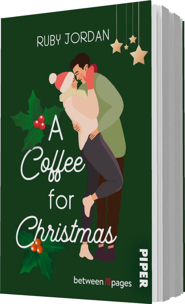 Das Buchcover zeigt ein winterliches, grünes Motiv mit einer romantischen Szene im Vordergrund. Darin stehen sich ein Mann und eine Frau in Umarmung gegenüber, beide lächeln. Die Frau trägt eine hellrosa Mütze und Handschuhe, während der Mann in einer grauen Jacke dargestellt ist. Unter dem Bild steht der Titel „A Coffee for Christmas“ in geschwungener, weißer Schrift. Oben sind kleine, goldene Sterne abgebildet. Der Autorname „Ruby Jordan“ befindet sich ebenfalls am oberen Rand.