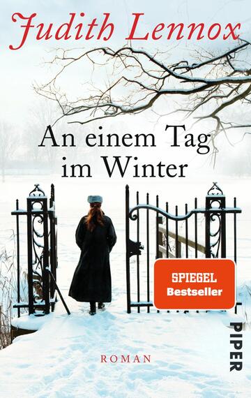 Das Buchcover zeigt eine winterliche Landschaft mit frischem Schnee und Bäumen im Hintergrund. Im Vordergrund steht eine Frau mit langen, braunen Haaren, bekleidet mit einem schwarzen Mantel und einer grauen Mütze. Sie steht an einem eleganten Eisenzaun, der leicht geöffnet ist. Über dem Hintergrund ist der Titel „An einem Tag im Winter“ in roter, verschnörkelter Schrift platziert. Darunter steht in kleinerer Schrift „Roman“. In der unteren rechten Ecke befindet sich ein oranger Sticker mit dem Text „SPIEGEL Bestseller“.