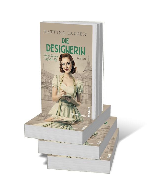 Bücherstapel des Buches „Neue Zeiten auf der Kö – Die Designerin“