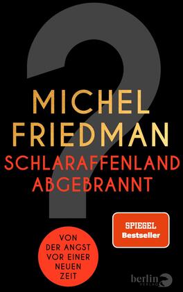 Das Buchcover zeigt einen schwarzen Hintergrund mit einem großen grauen Fragezeichen, das die zentrale Komponente bildet. Der Titel „SCHLARAFFENLAND ABGEBRANNT“ ist in auffälligem Rot gehalten und befindet sich unter dem Autorennamen „MICHEL FRIEDMAN“, der in goldenen Buchstaben erscheint. Unten auf dem Cover steht der Hinweis „SPIEGEL Bestseller“ in einem weißen Kasten. Darunter befindet sich der Untertitel „VON DER ANGST VOR EINER NEUEN ZEIT“ in dezenten, grauen Buchstaben. Die Gesamtatmosphäre vermittelt eine Mischung aus Dramatik und Provokation.