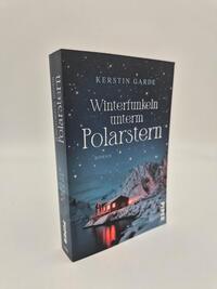 Außenansicht des Buches „Winterfunkeln unterm Polarstern“