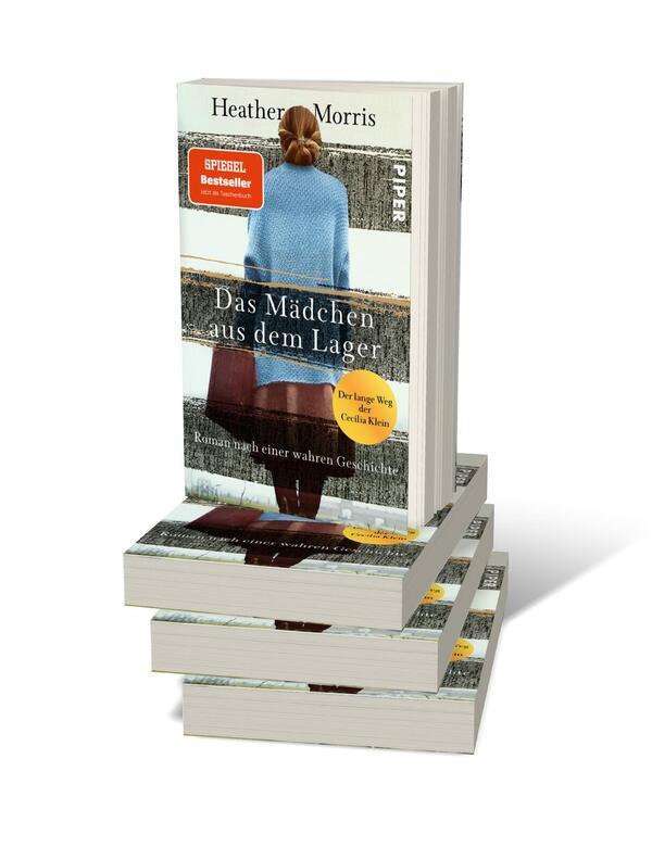Bücherstapel des Buches „Das Mädchen aus dem Lager – Der lange Weg der Cecilia Klein“