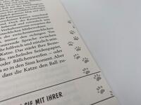 Innenansicht des Buches „Pfoten vom Tisch!“