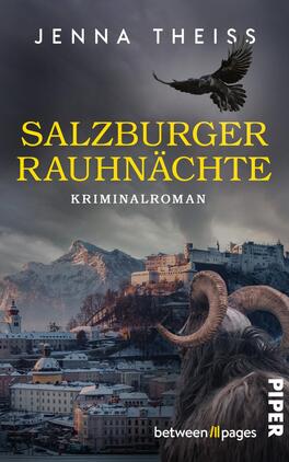 Salzburger Rauhnächte Das Buchcover zeigt eine winterliche Ansicht von Salzburg mit der Hohensalzburg-Festung vor blau-grauem, bewölktem Himmel; im Vordergrund ein großes, gehörntes Tier mit gedrehten Hörnern. Ein schwarzer Rabe fliegt über der Stadt. Oben steht die Autorin „Jenna Theiss“ in weißen Großbuchstaben, der Titel „Salzburger Rauhnächte“ in großen gelben Lettern, darunter klein „Kriminalroman“. Die Stimmung ist düster und unheilvoll.