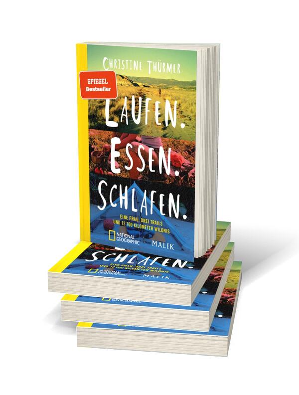 Bücherstapel des Buches „Laufen. Essen. Schlafen. “