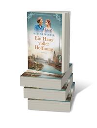Bücherstapel des Buches „Ein Haus voller Hoffnung“