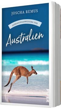 Das Buchcover zeigt einen klaren, blauen Himmel sowie einen sandigen Strand mit türkisfarbenem Wasser. Im Vordergrund springt ein Känguru über den Sand, was Dynamik und Abenteuerlust vermittelt. Der Titel „Gebrauchsanweisung für Australien“ ist in eleganter, geschwungener Schrift in Weiß gehalten, während der Autorname „Joscha Remus“ oben auf dem Cover in schlichter, klarer Schrift steht. Die Farbgestaltung erzeugt eine einladende, sommerliche Atmosphäre.