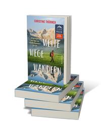 Bücherstapel des Buches „Weite Wege Wandern“