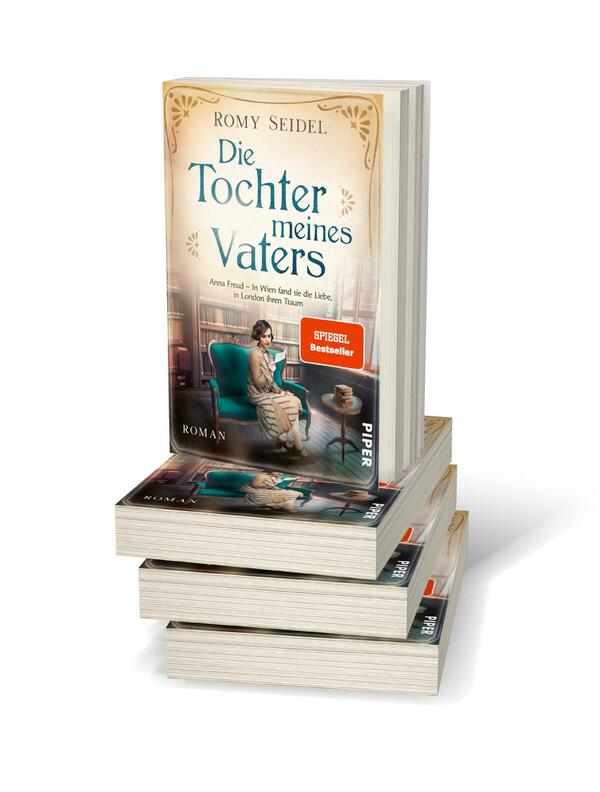 Bücherstapel des Buches „Die Tochter meines Vaters“