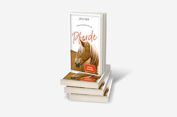 Bücherstapel des Buches „Gebrauchsanweisung für Pferde“