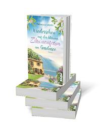 Bücherstapel des Buches „Lemon Blossoms – Wiedersehen in der kleinen Zitronenfarm am Gardasee“