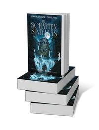 Bücherstapel des Buches „Der dunkle Brunnen“