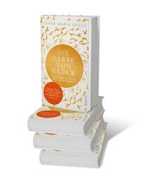 Bücherstapel des Buches „Die Farbe von Glück“