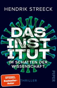 Das Buchcover zeigt vor dunkelblauem Hintergrund eine große stilisierte grün-türkise Viren-Illustration, darüber der Autorname Hendrik Streeck in schmaler weißer Großschrift. Zentral dominierend der Titel „DAS INSTITUT“ in großer, weißer, leicht strukturiert wirkender Blockschrift, darunter die Unterzeile „IM SCHATTEN DER WISSENSCHAFT“ in kleinerer weißer Grotesk. Stimmung: bedrohlich, klinisch, thrillerhaft. Unten links ein orangefarbener Button mit weißer Aufschrift „SPIEGEL Bestseller-Autor“.