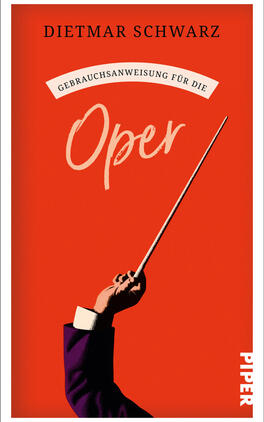 Das Buchcover zeigt vor orangerotem Hintergrund oben den Autorennamen „Dietmar Schwarz“, darunter in einem weißen Bogen die Einordnung „Gebrauchsanweisung für die“ und groß in handschriftlicher, hellrosa Schrift das Wort „Oper“. Unten links eine erhobene Hand mit dunkelviolettem Sakko hält einen langen Dirigentenstab, rechts unten senkrecht der Verlagsname.