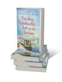 Bücherstapel des Buches „Das kleine Weihnachtsboot an der Nordsee“