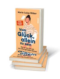 Bücherstapel des Buches „Vom Glück, allein zu sein“