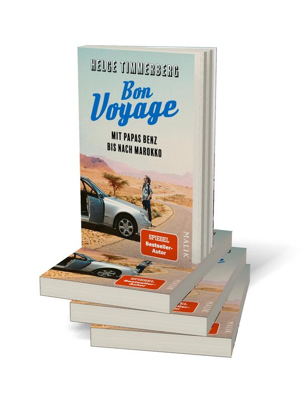 Bücherstapel des Buches „Bon Voyage“