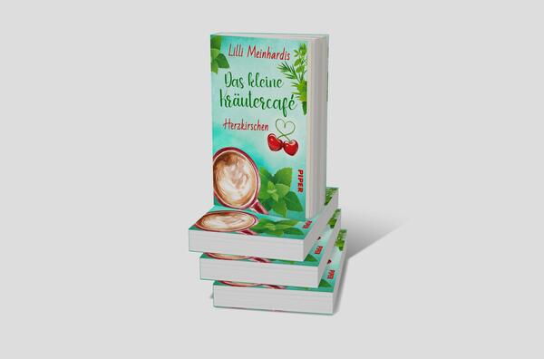 Bücherstapel des Buches „Das kleine Kräutercafé – Herzkirschen“