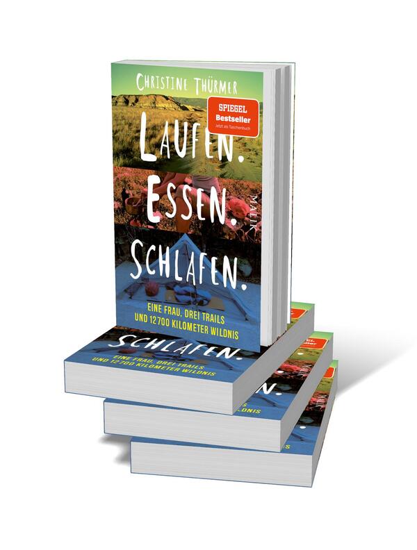 Bücherstapel des Buches „Laufen. Essen. Schlafen. “