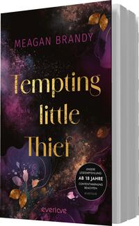 Das Buchcover zeigt einen dunklen Hintergrund mit lebhaften, violetten und rosa Farbtönen, die durch mystische Goldakzente ergänzt werden. In der Mitte steht der Titel „Tempting little Thief“ in eleganter, goldener Schrift. Darüber prangt der Name der Autorin, Meagan Brandy, ebenfalls in einer auffälligen Schriftart. Am unteren Rand befindet sich ein Hinweis zur Leseempfehlung „AB 18 JAHRE“ in einem weißen, runden Button. Die Anordnung der Elemente vermittelt eine geheimnisvolle und anziehende Atmosphäre.