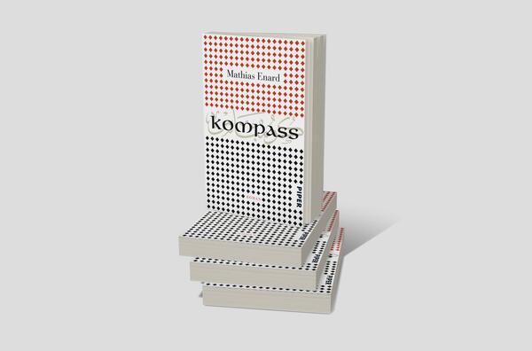 Bücherstapel des Buches „Kompass“
