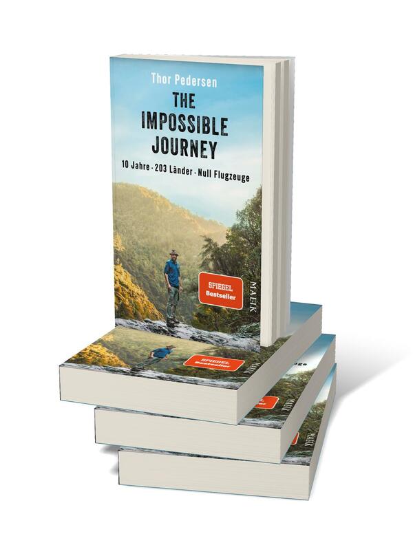Bücherstapel des Buches „The Impossible Journey“