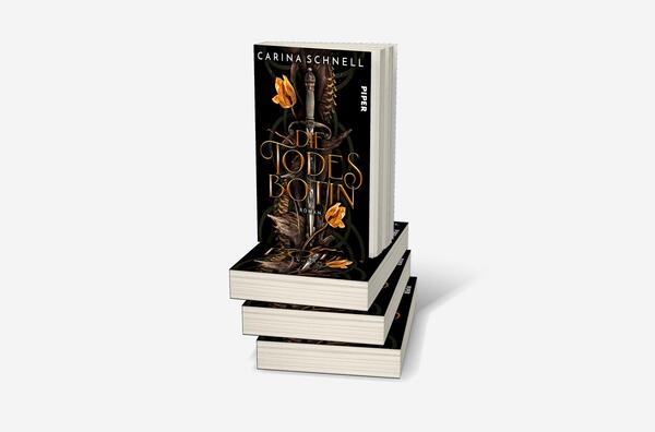 Bücherstapel des Buches „Die Todesbotin“