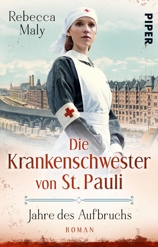 Das Buchcover zeigt eine Krankenschwester in historischen Uniform, die einen weißen Haarschleier trägt und mit einem roten Kreuz auf ihrer Schürze gekennzeichnet ist. Im Hintergrund ist eine Stadtansicht mit einem Hafen zu sehen, was eine maritime Atmosphäre vermittelt. Die Farbgestaltung umfasst sanfte Blautöne und warme Erdtöne. Der Titel „Die Krankenschwester von St. Pauli“ ist in geschwungener roter Schrift hervorgehoben, während der Autorennamen „Rebecca Maly“ oben links in kleinerer Schrift platziert ist. Unter dem Titel steht „Jahre des Aufbruchs“ in etwas kleinerer Schrift.