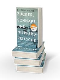 Bücherstapel des Buches „Zucker, Schnaps und Nilpferdpeitsche“