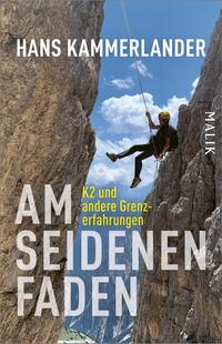Das Buchcover zeigt eine Person beim Abseilen zwischen steilen, bräunlich-grauen Felswänden vor strahlend blauem Himmel mit weißen Wolken. Oben steht der Autorenname „Hans Kammerlander“ in weißen Großbuchstaben; der Titel „AM SEIDENEN FADEN“ dominiert großflächig in weißer, fetter, serifenloser Schrift; die gelbe Unterzeile „K2 und andere Grenzerfahrungen“ ist kleiner. Der Kletterer trägt einen gelben Helm, Gurt und ein Seil, die Szene wirkt spannungsreich und luftig.