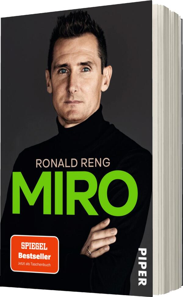 Das Buchcover zeigt ein Porträt eines Mannes mit kurz geschnittenen, dunklen Haaren und einem ernsthaften Blick. Er trägt einen schwarzen Rollkragenpullover vor einem grauen Hintergrund. Der Titel „MIRO“ steht in großen, leuchtend grünen Buchstaben im unteren Drittel, während der Autorennamen „RONALD RENG“ in kleinerer Schrift darüber angeordnet ist. Ein rotes Rechteck oben links weist auf den Status als „SPIEGEL Bestseller“ hin. Das Cover vermittelt eine moderne und ansprechende Atmosphäre.