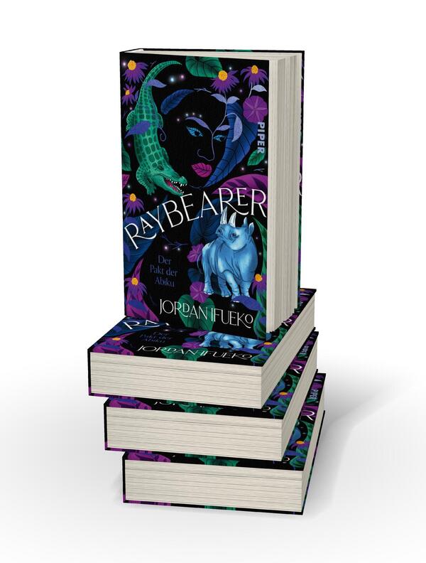 Bücherstapel des Buches „Raybearer – Der Pakt der Abiku“