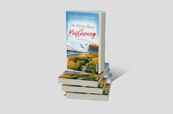 Bücherstapel des Buches „Das kleine Haus am Küstenweg“