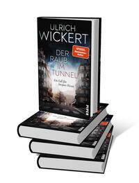 Bücherstapel des Buches „Der Raub im Tunnel“