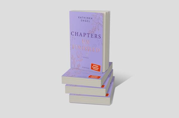 Bücherstapel des Buches „Chapters unfinished“