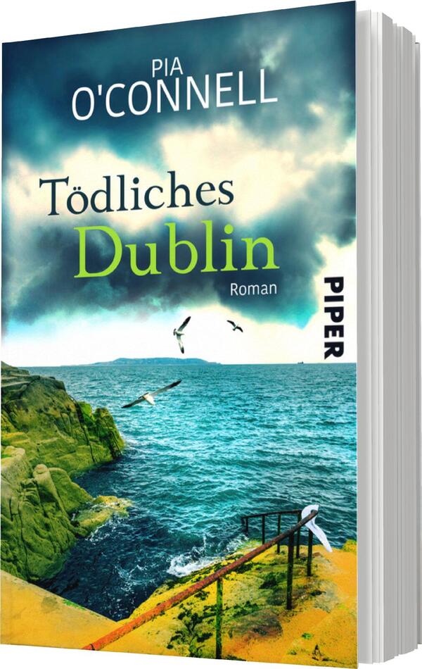 Das Buchcover zeigt eine dramatische Küstenlandschaft mit einem dunklen, wolkenverhangenen Himmel. Im Vordergrund sind grüne Felsen und ein gelber Steg sichtbar, der ins Wasser führt. In der Mitte des Covers thront der Titel „Tödliches Dublin“ in leuchtendem Grün, unterstrichen von einem schlichten Schriftzug „Roman“. Oben steht der Name der Autorin, „Pia O’Connell“, in Weiß. Das Cover vermittelt eine spannungsgeladene, geheimnisvolle Atmosphäre.