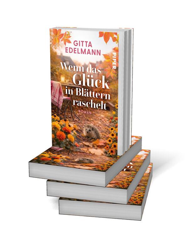 Bücherstapel des Buches „Wenn das Glück in Blättern raschelt“